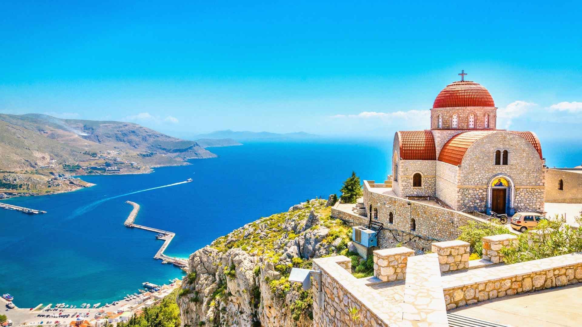 symi rhodes greece church above the water